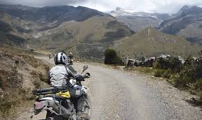 riding a motorcycle in the mountains