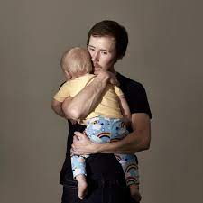 A high school boy who was pregnant with a baby that kicks strongly.