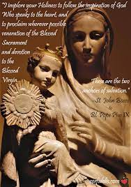 Mary holds down Baby Jesus and Don Bosco points at it