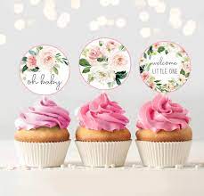 A girl took one pink cupcake