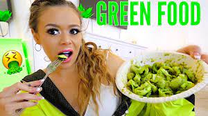 A girl ate green food