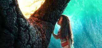 Moana touches Te Ka's forehead and he bows his head and Te Ka closes his eyes